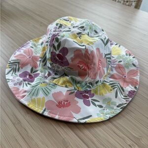 Carters spring reversible floral/ purple baby girl hat 6-12 months